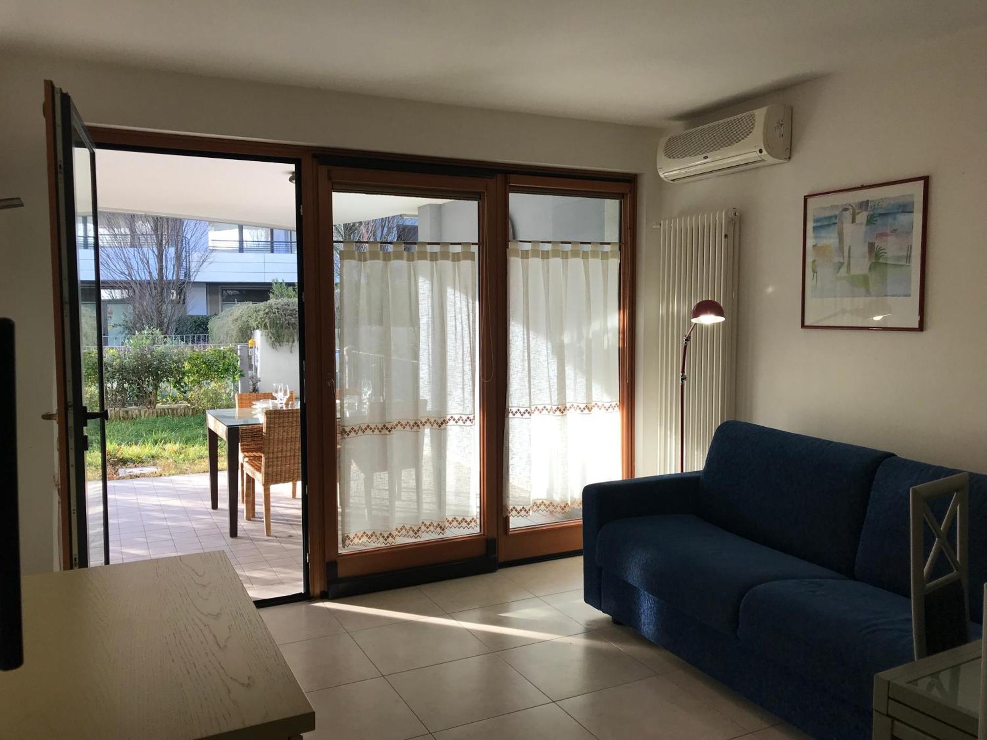 Costa Azzurra Apartment Grado Phòng bức ảnh