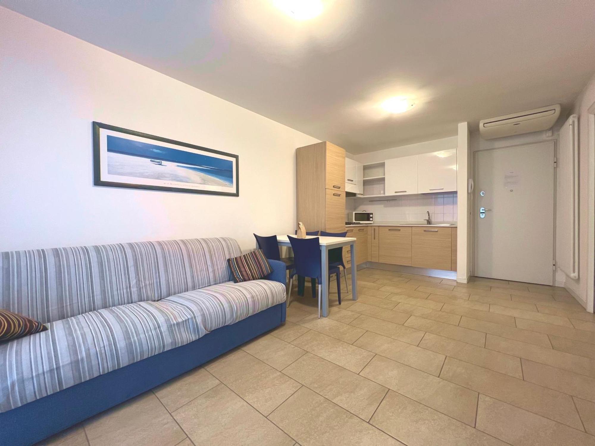Costa Azzurra Apartment Grado Phòng bức ảnh