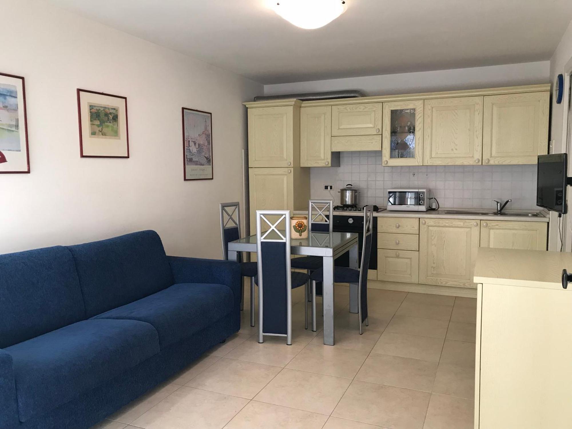 Costa Azzurra Apartment Grado Phòng bức ảnh